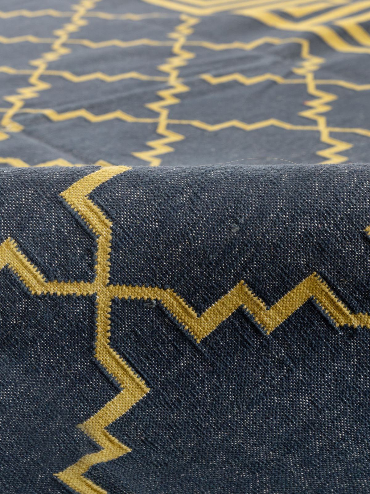 Nautical Jali Flatweave rug detail of the geometric pattern in cotton