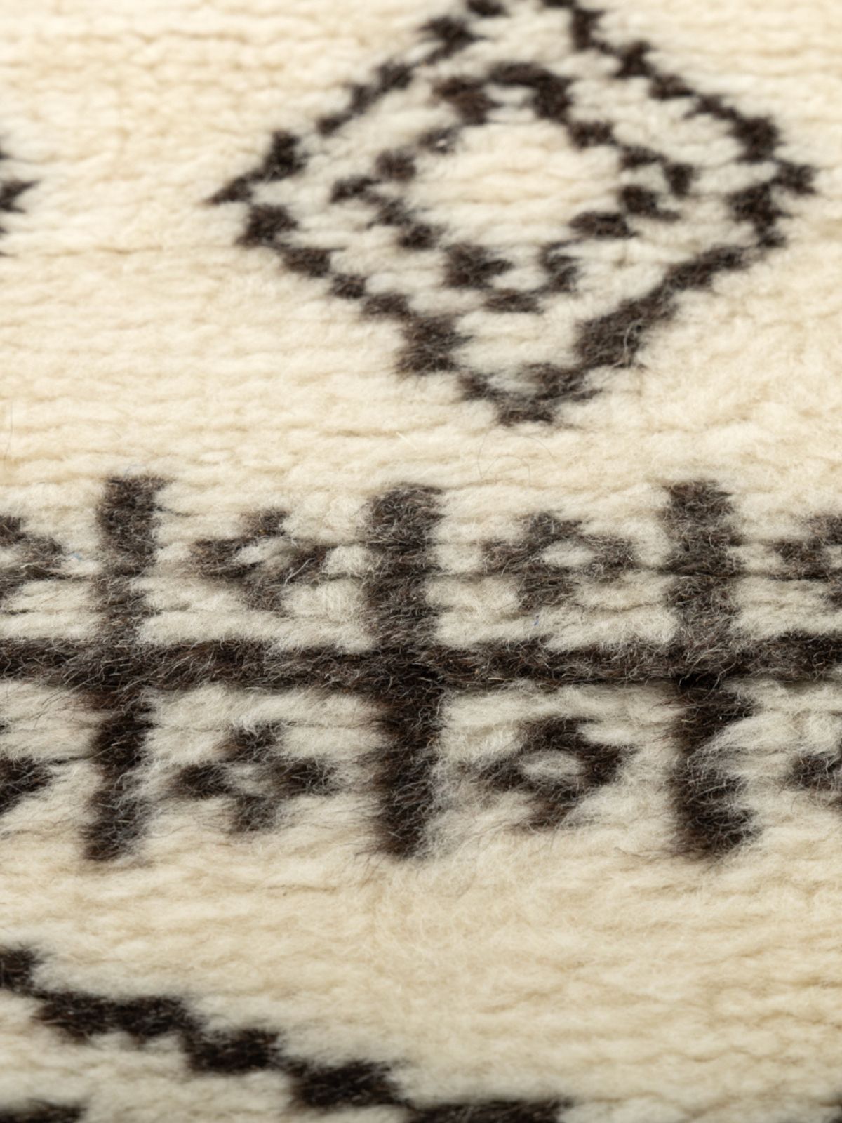 Nomad Noir Hand-Knotted Tribal Rug - additional product view showing the wool rug