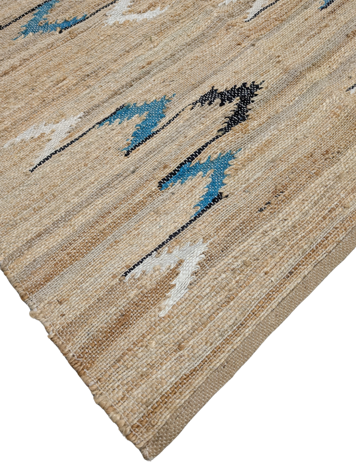 Nomadic Trails close-up showing the cotton weave and traditional motif