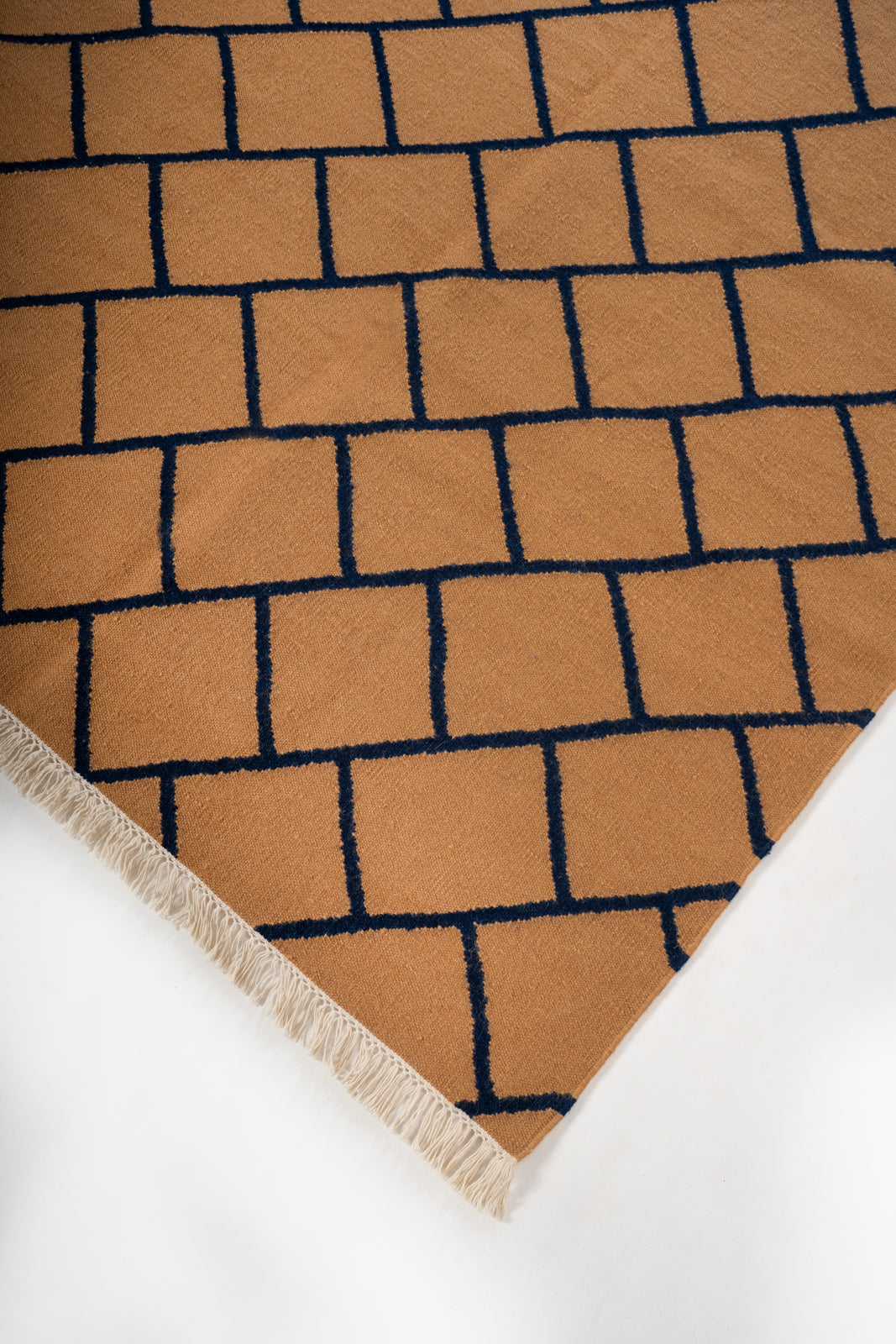 Ochre Lattice Wool Rug close-up showing the wool weave and geometric motif