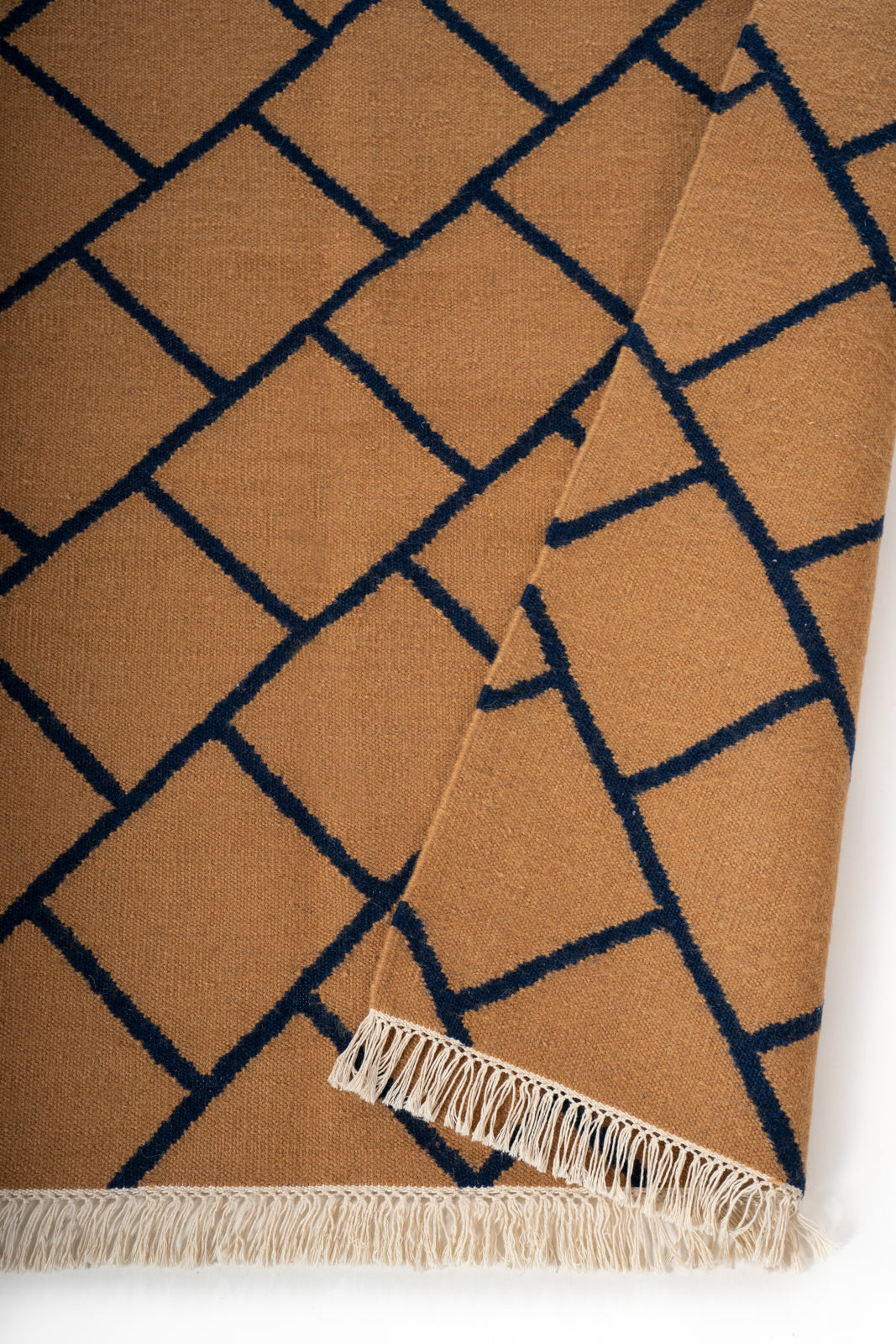 Ochre Lattice Wool Rug detail of the geometric pattern in wool