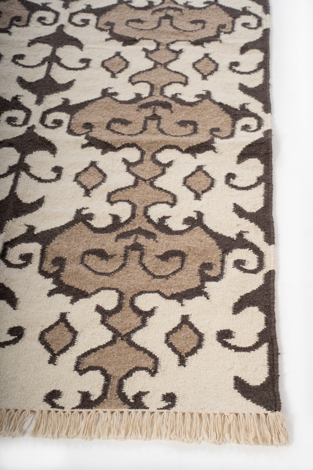 Ornate Harmony Wool Rug wool rug styled in a living room interior