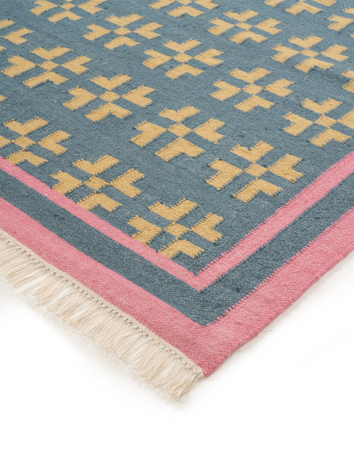 Pastel Cross Motif Flatweave Rug close-up showing the wool weave and geometric motif