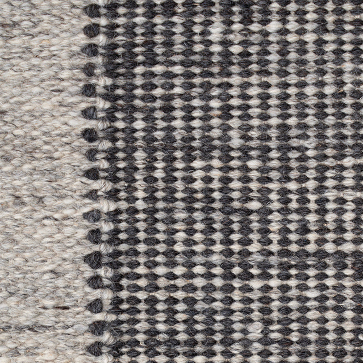 Pathra : Carbon trace close-up weave detail showing the afghan wool surface