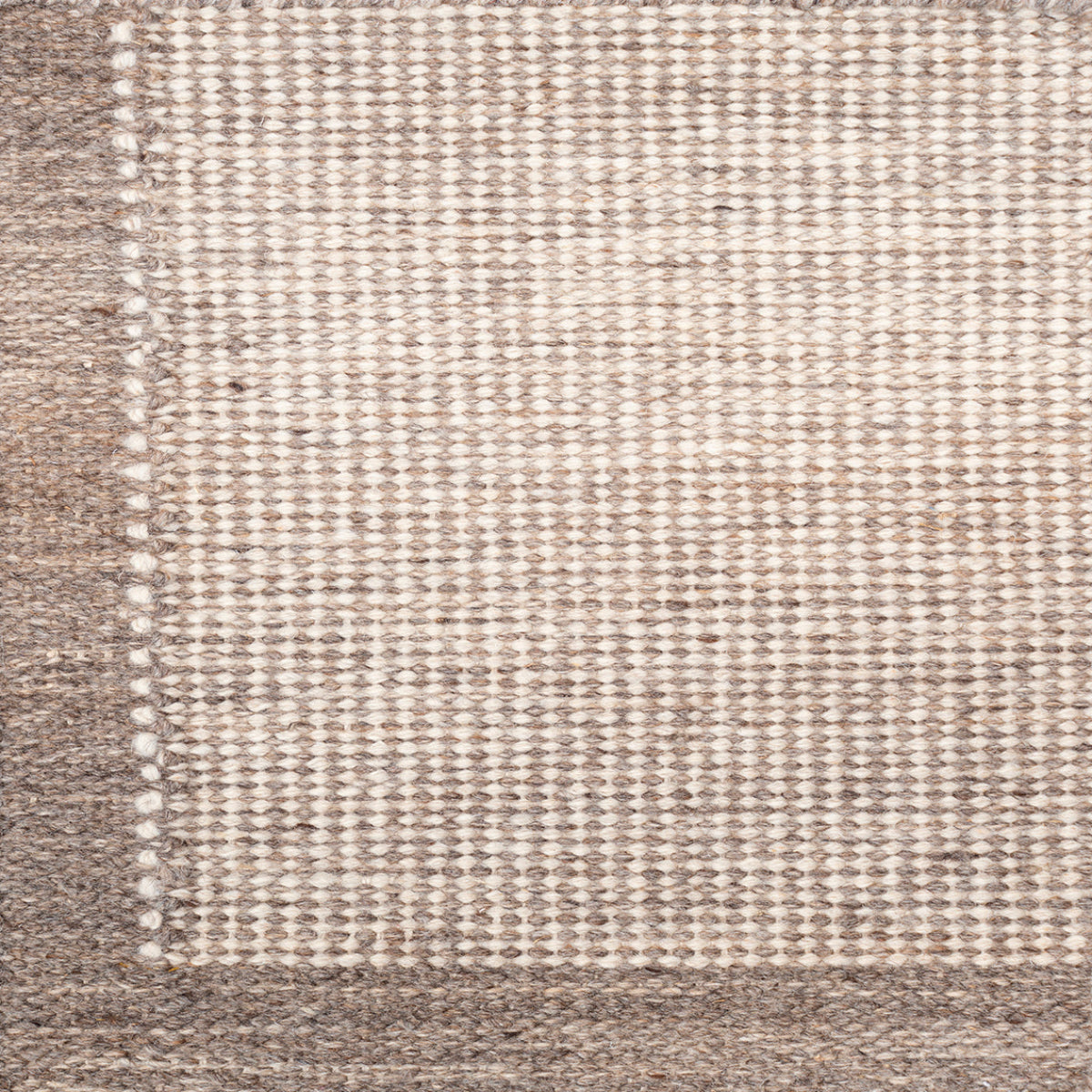 Pathra : Fossil grain afghan wool rug in grey tones, overhead view