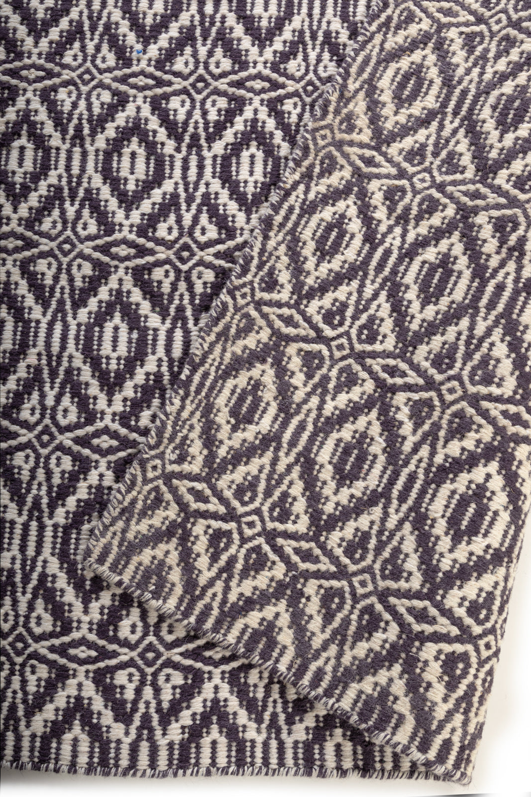 Quiet Shoreline Rug detail of the striped wool surface and edge finishing