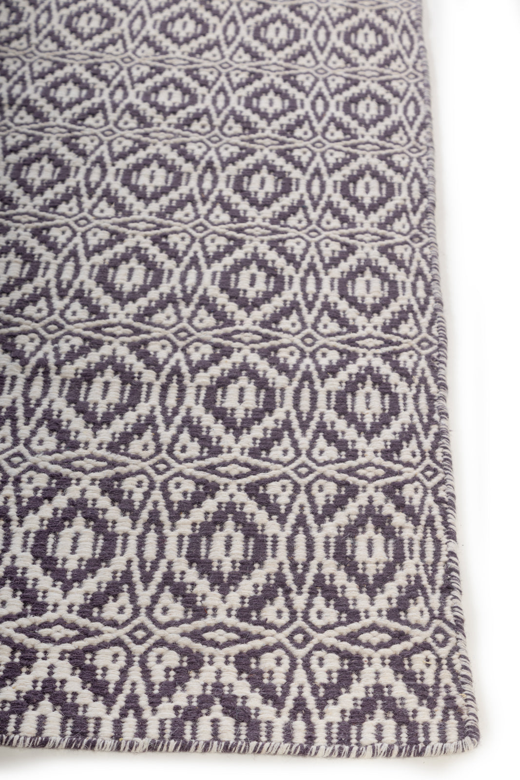 Quiet Shoreline Rug wool rug styled in a living room interior