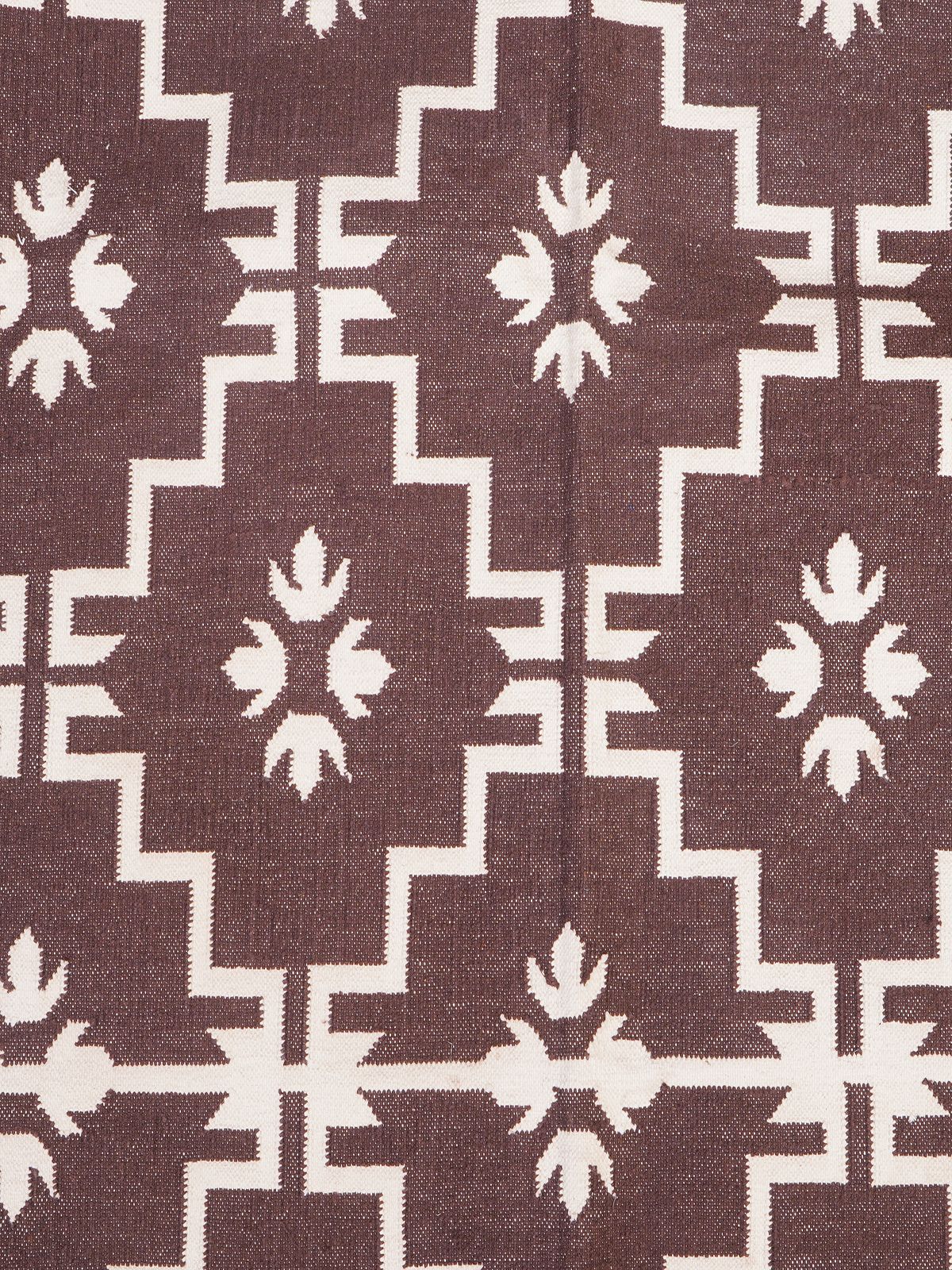 Regal Mocha Flatweave Rug cotton rug styled in a living room interior