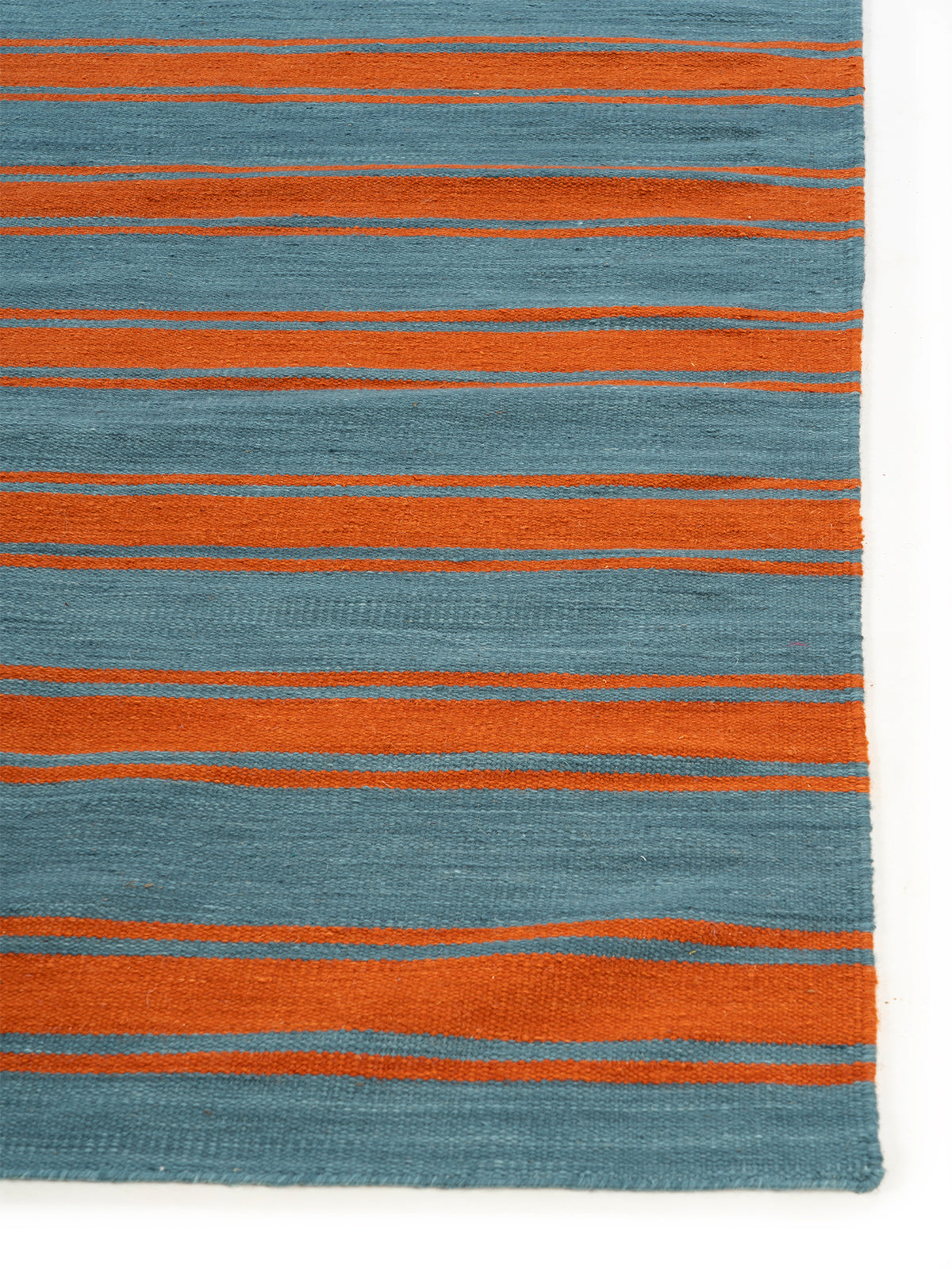 Retro Block Stripe Wool Flatweave wool rug styled in a living room interior