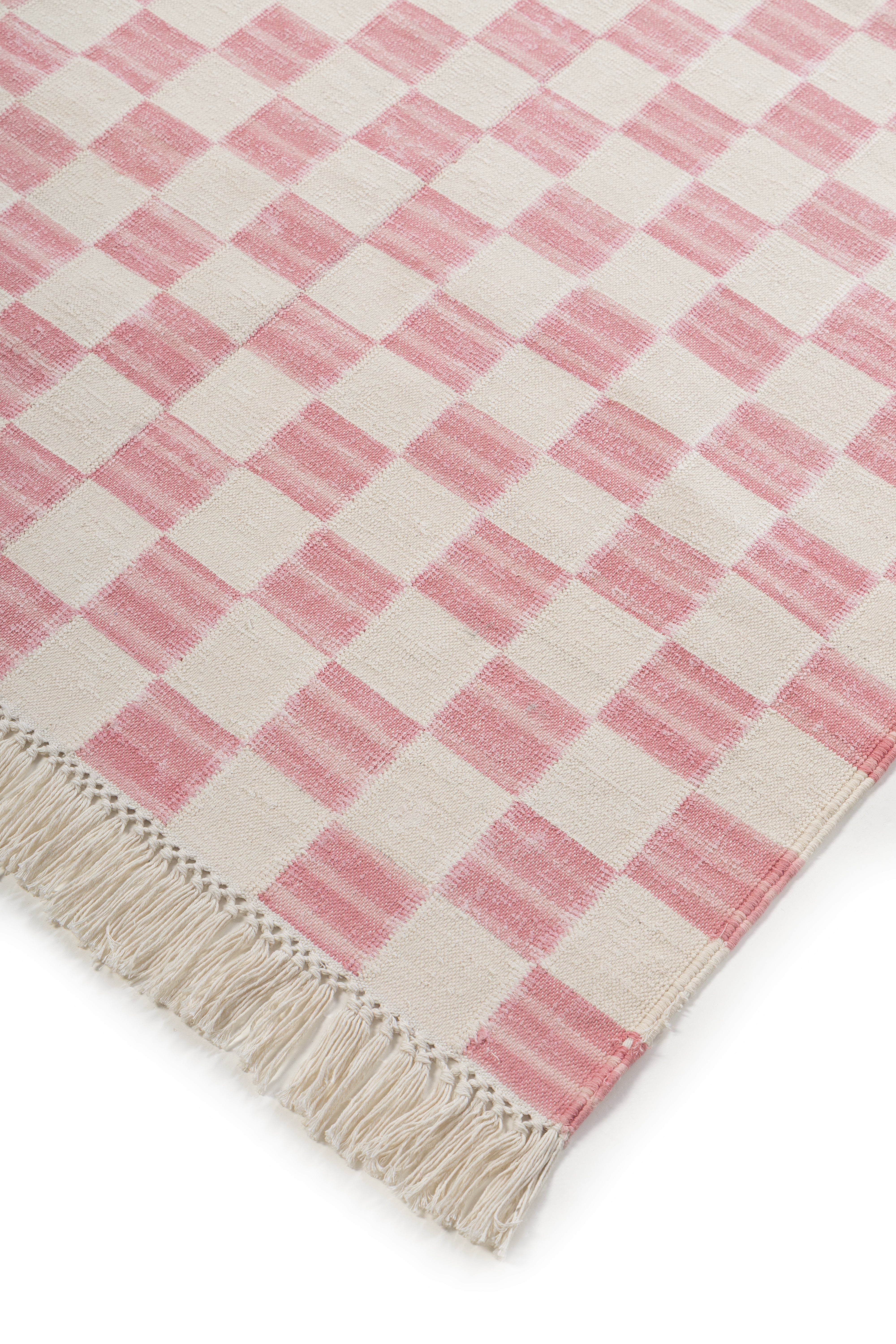 Rosewood Checkered Rug close-up showing the cotton weave and geometric motif