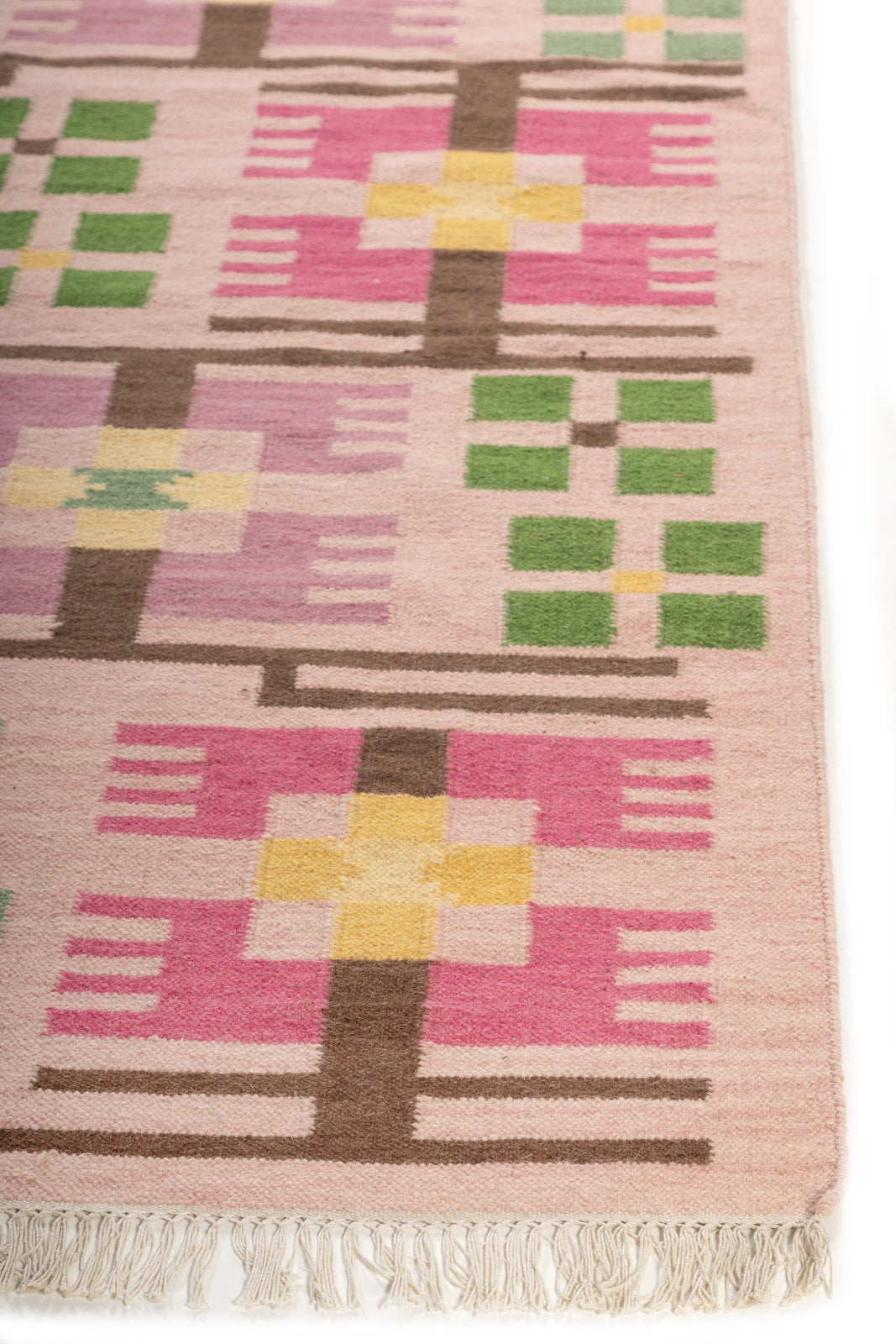 Rosy Prism Wool Rug wool rug styled in a living room interior