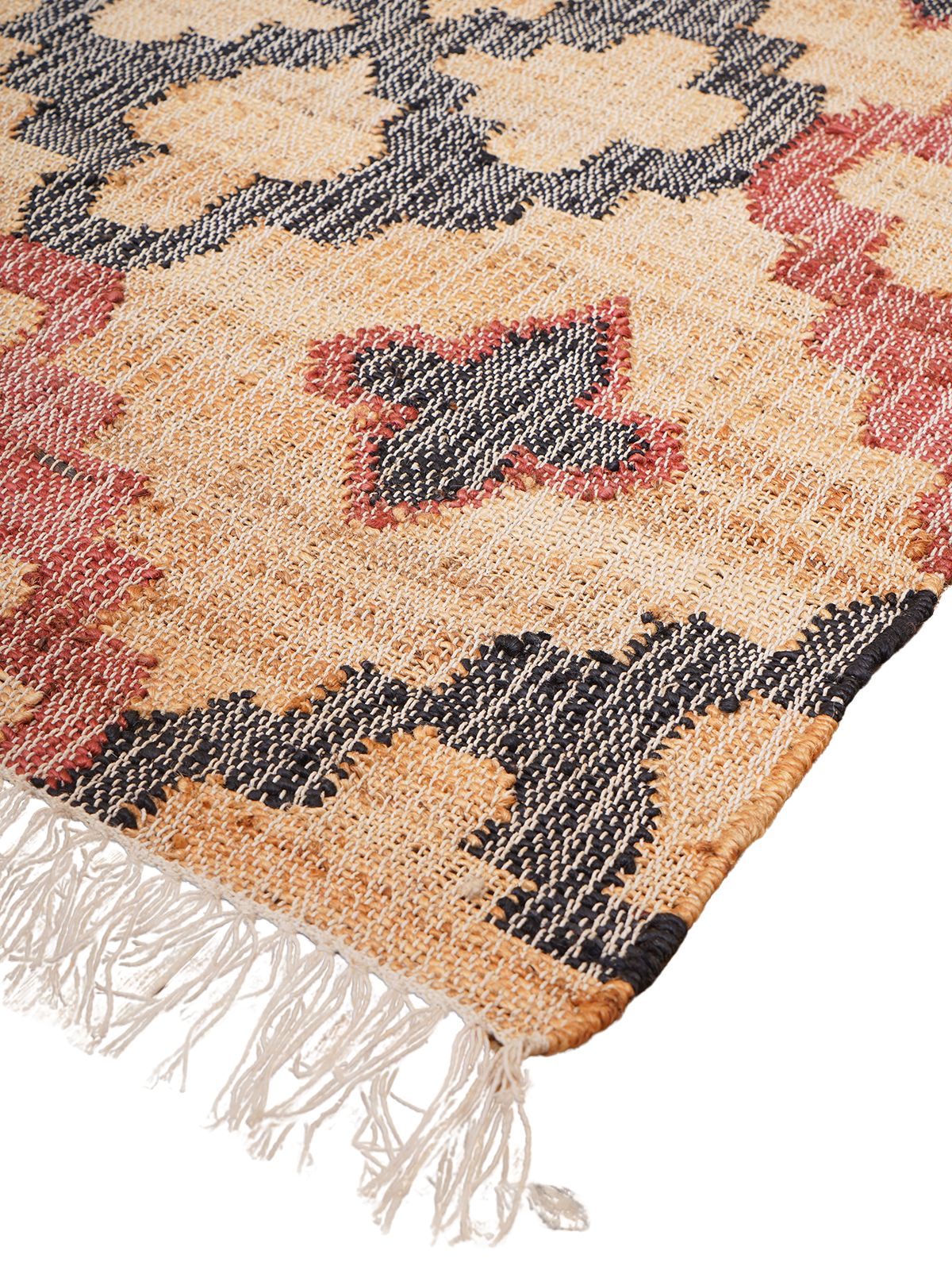 Rouge Reflection Jute Rug close-up showing the jute weave and geometric motif