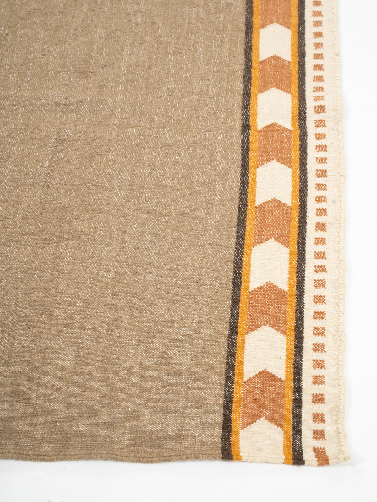 Rust Moor Runner - cotton runner laid in a hallway view