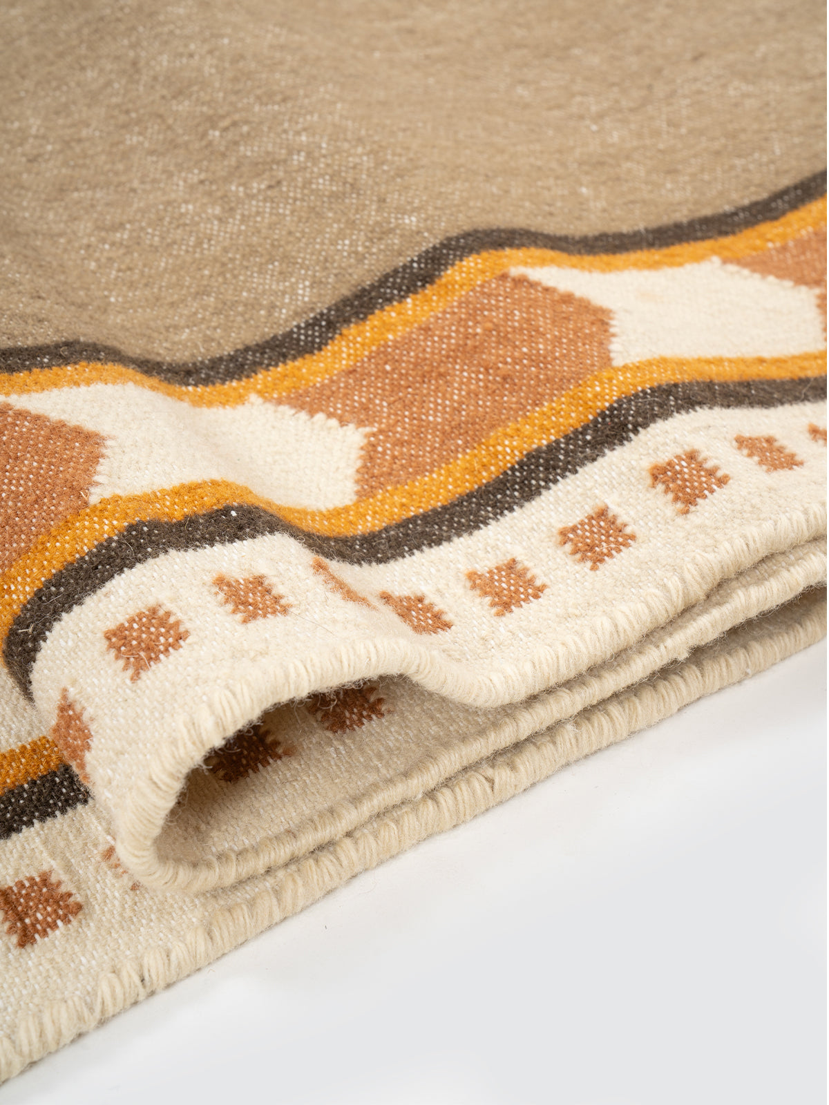 Rust Moor Runner - cotton runner laid in a hallway view