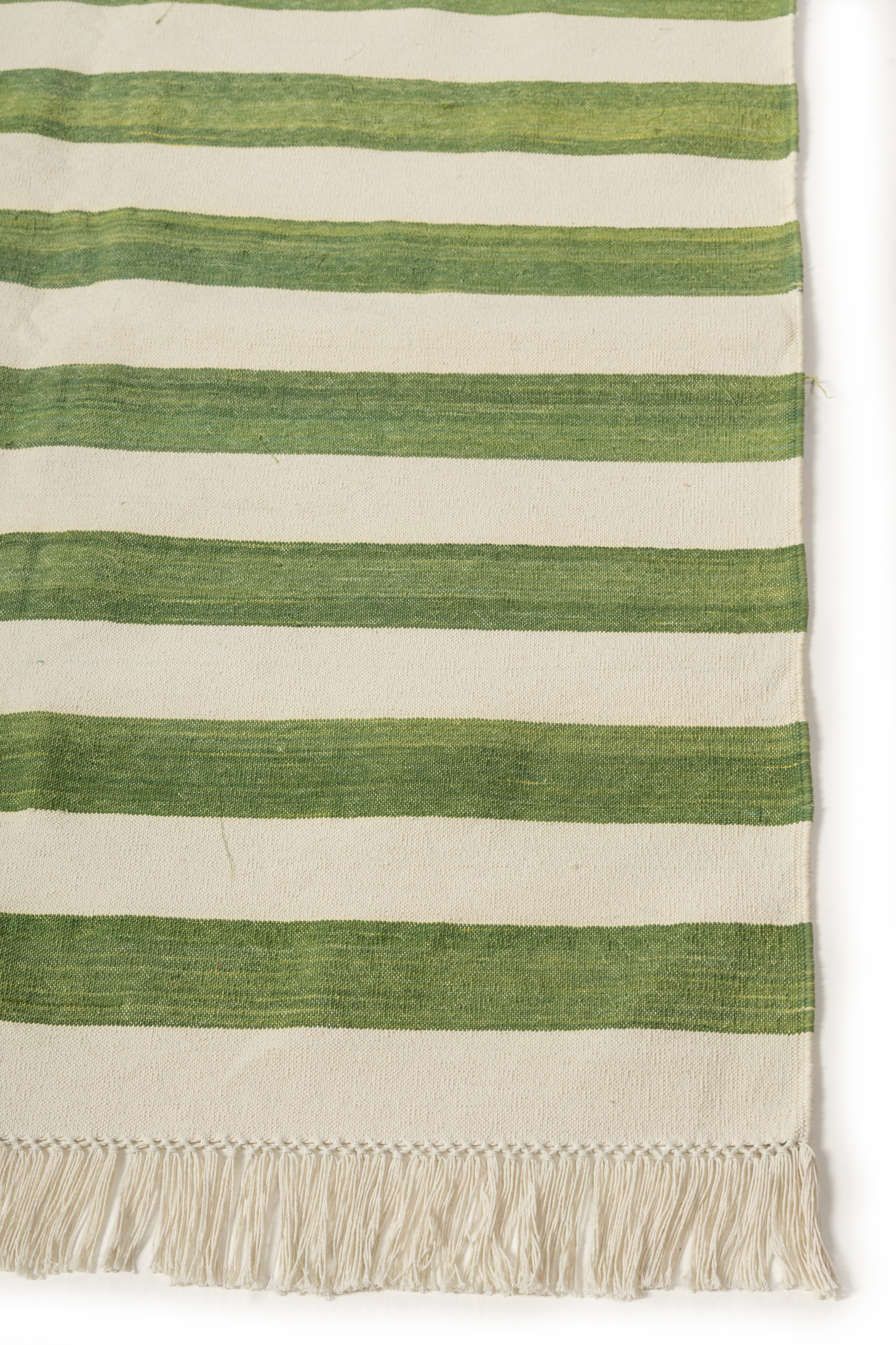 Sage Coast Flatweave Rug cotton rug styled in a living room interior