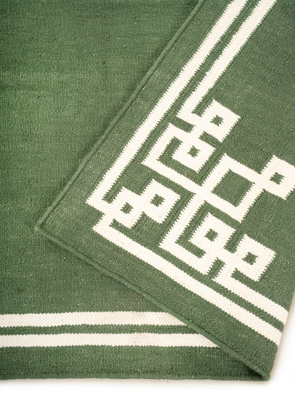 Sage Cornerstone Rug detail of the geometric pattern in wool