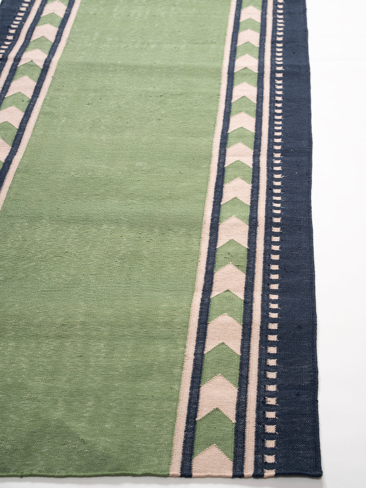 Sage Moor Runner - cotton runner laid in a hallway view