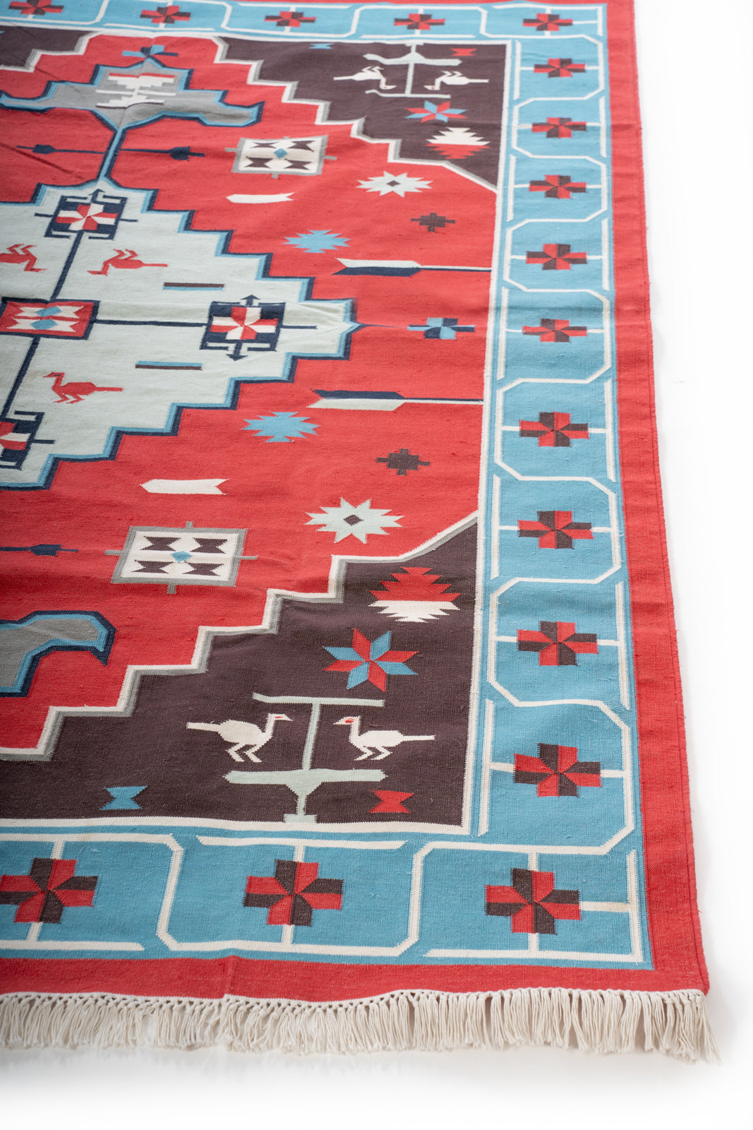 Sands of Time Cotton Flatweave Rug cotton rug styled in a living room interior