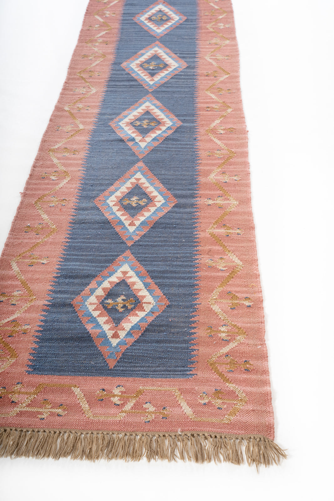 Sands of time Wool Runner wool stair runner styled on a staircase in a designed interior
