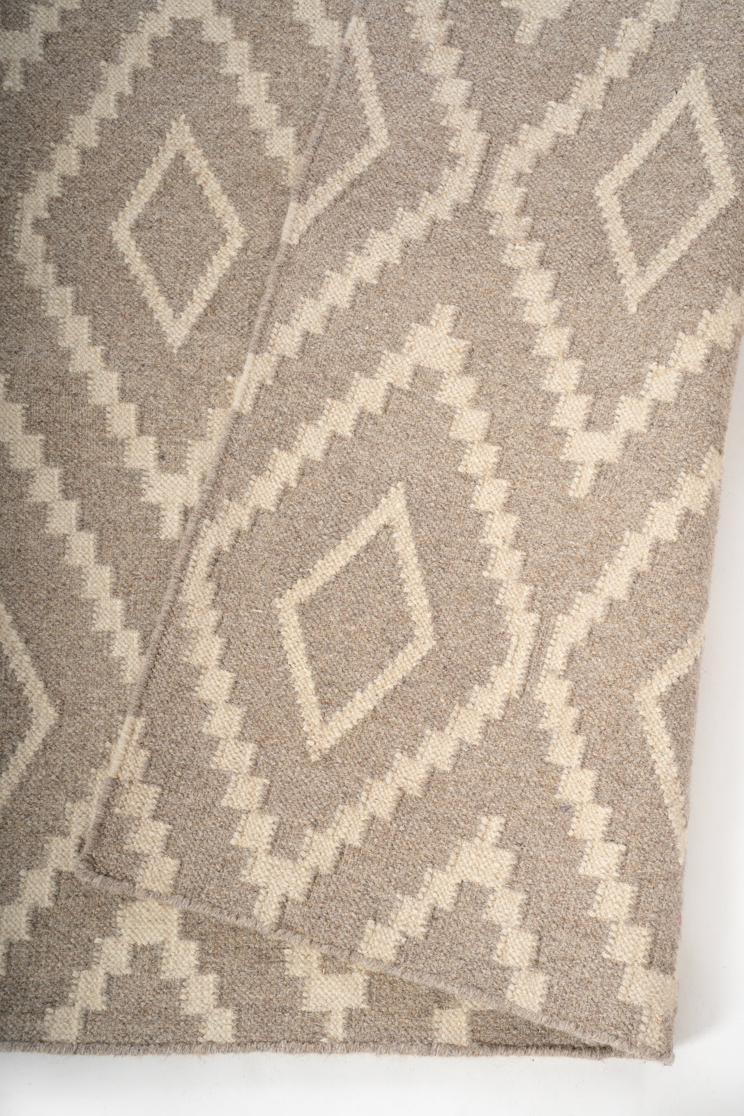 Sandstone Diamond Wool Rug detail of the geometric pattern in wool