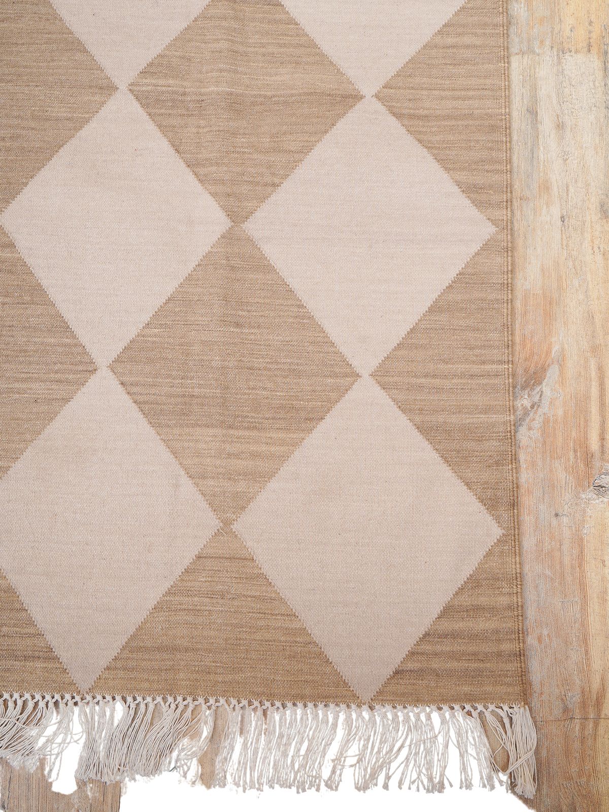 Sandstone Serenade Flatweave Rug cotton rug styled in a living room interior