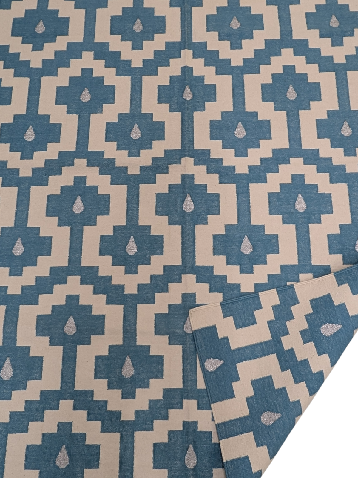 Santorini Steps Flatweave Rug detail of the geometric pattern in cotton