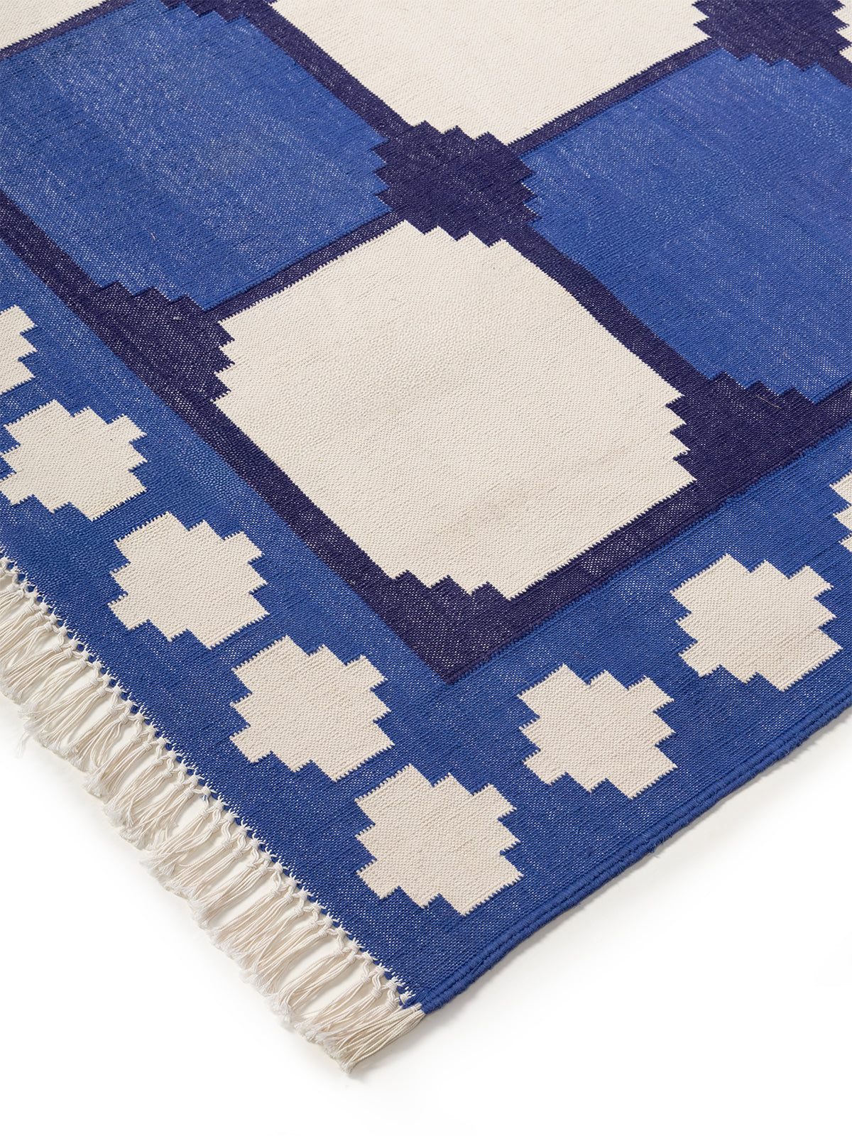 Sapphire Essence Flatweave Rug-Navy close-up showing the cotton weave and geometric motif