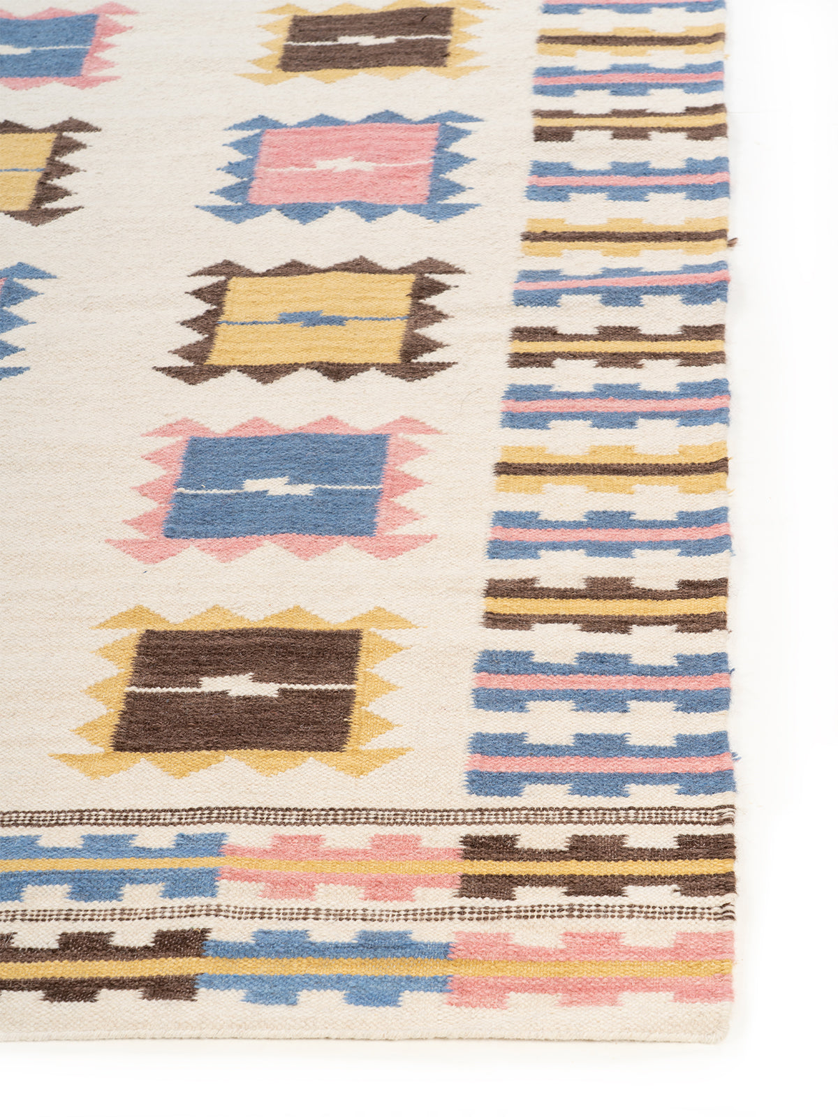 Scandi Block Flatweave Rug wool rug styled in a living room interior