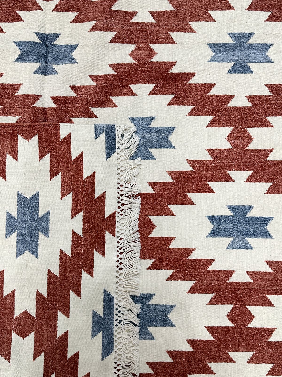 Scarlet & Ocean Kilim Cotton Flatweave Rug detail of the traditional motif in cotton