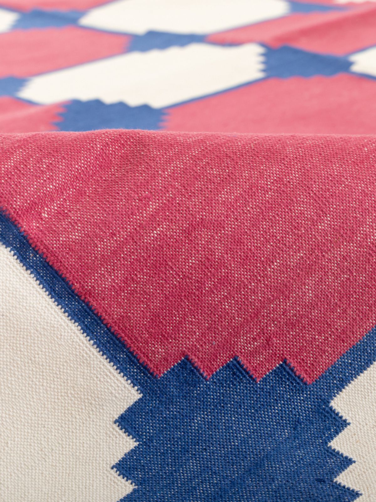 Scarlet Wave Modern Kilim Rug detail of the geometric pattern in cotton