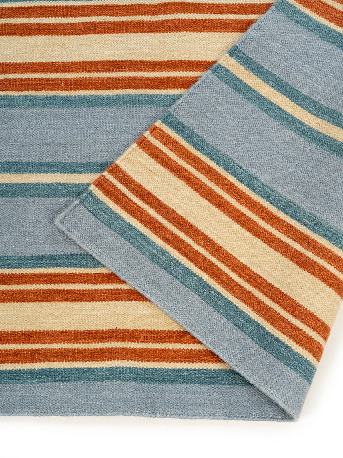 Seaside Stripe Wool Rug detail of the striped wool surface and edge finishing