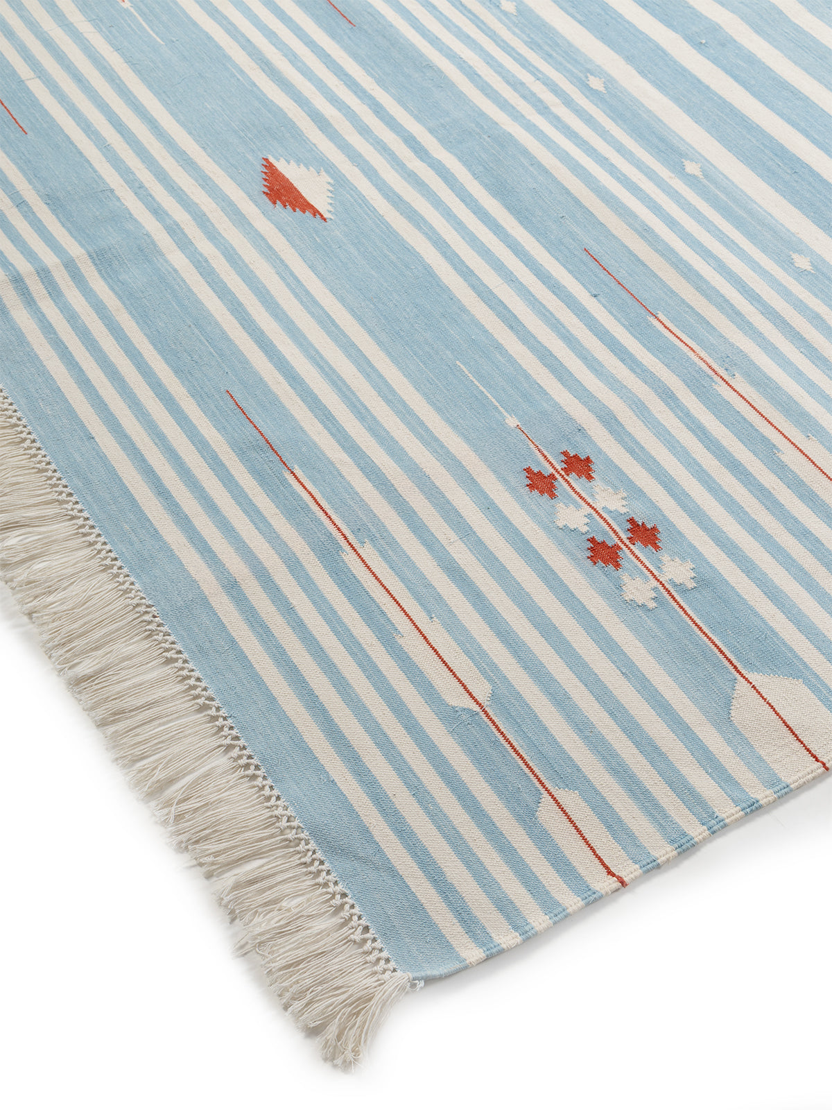 Sky Drift Rug close-up showing the cotton weave and striped pattern
