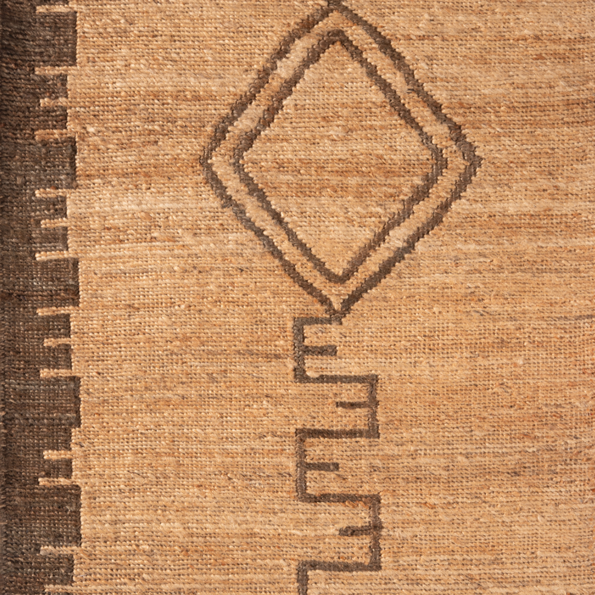 Soumak Soul : Ancient Emblem jute rug in brown tones