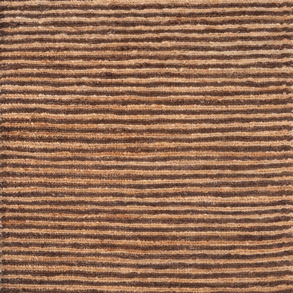 Soumak Soul : Rhythm Weave jute rug in brown tones