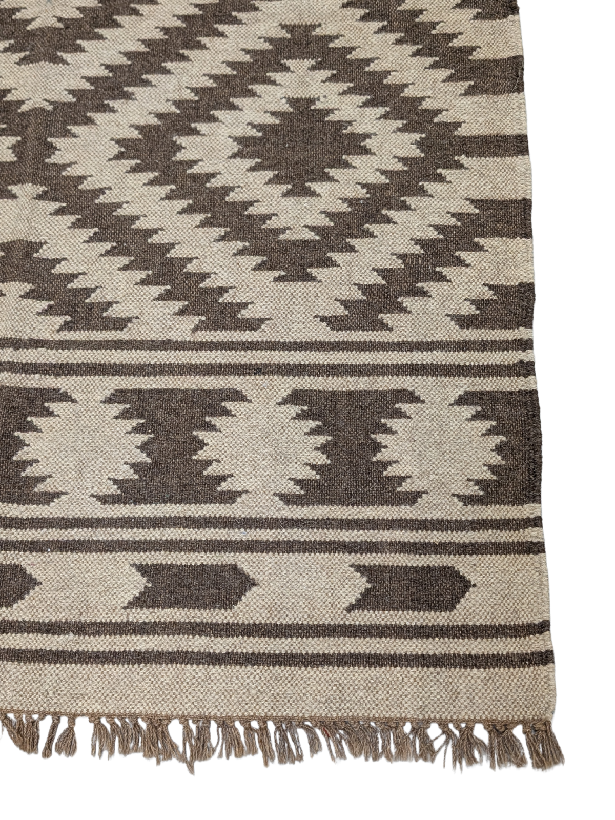 Stone & Sand Flatweave cotton rug styled in a living room interior