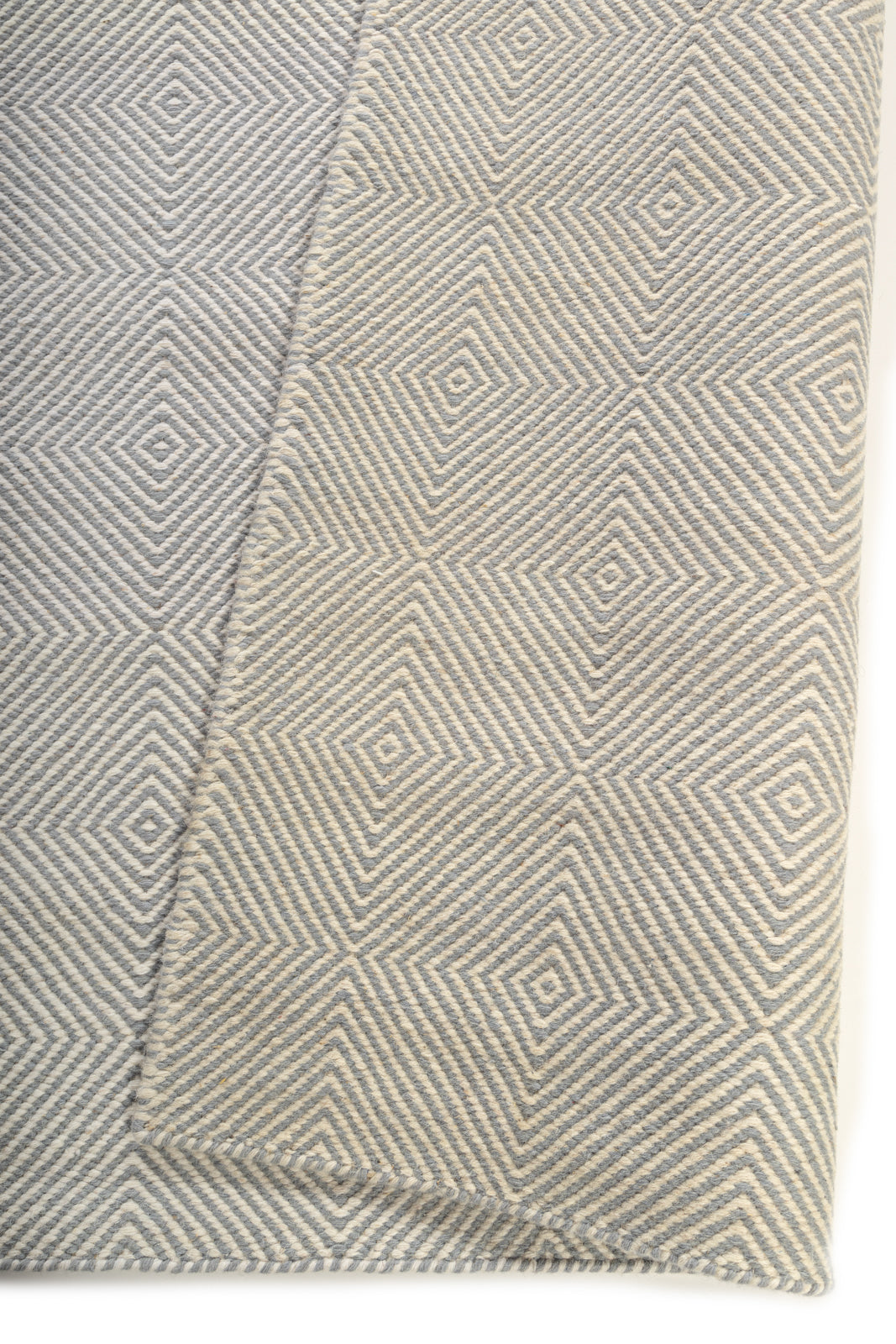 Stonehaven Shuttle Rug detail showing the textured wool surface and finishing