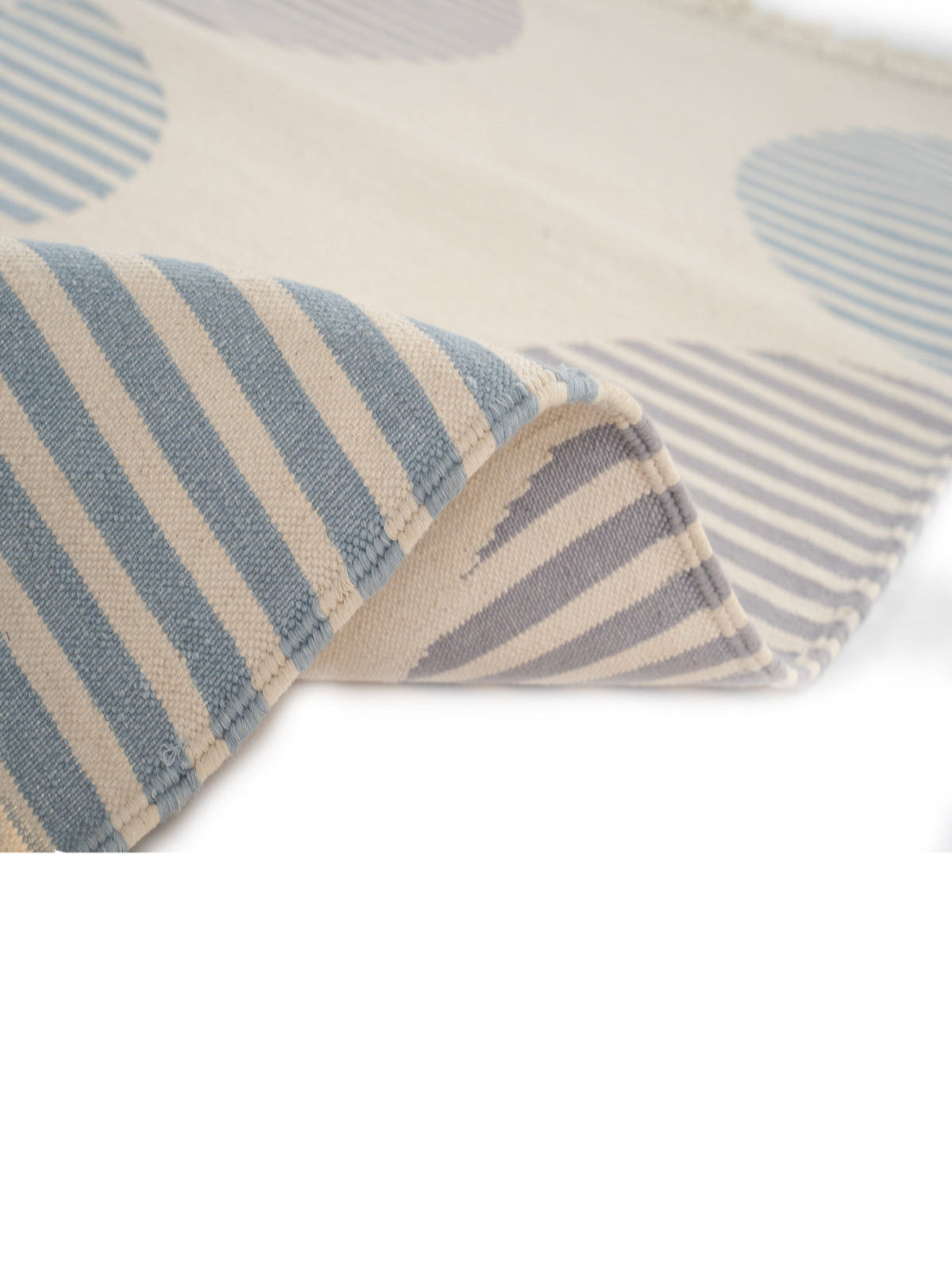 Striped Circles Reversible Handwoven Cotton Rug close-up showing the cotton weave and geometric motif
