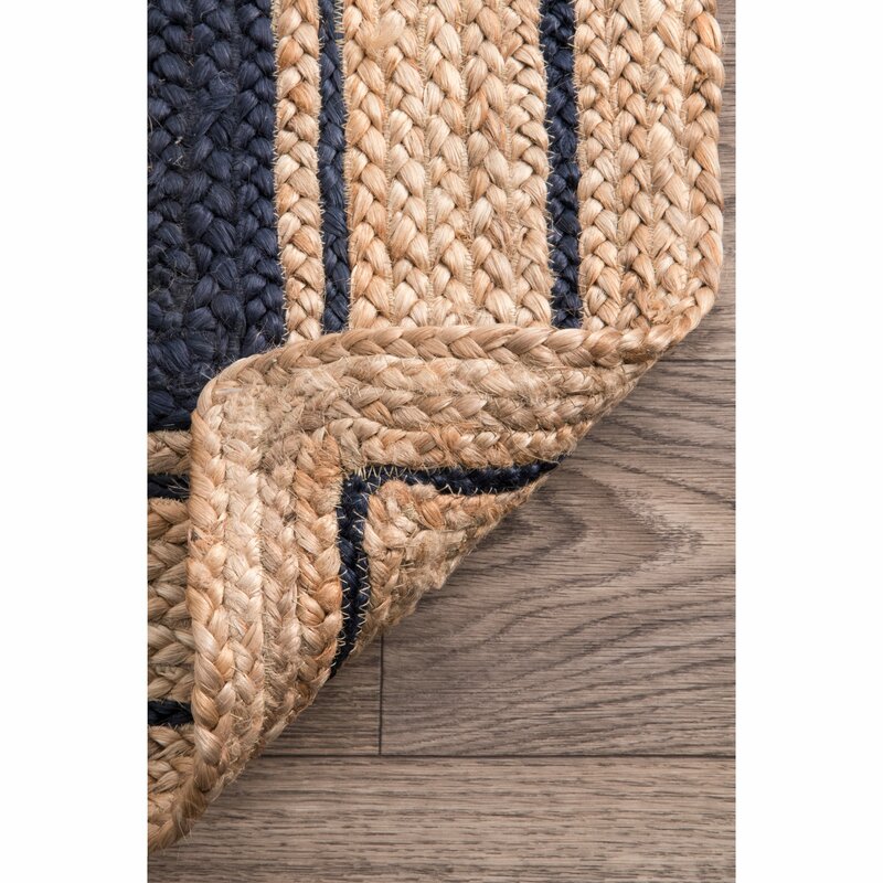 Suez bordered jute braided area rug-Navy close-up showing the jute weave and striped pattern
