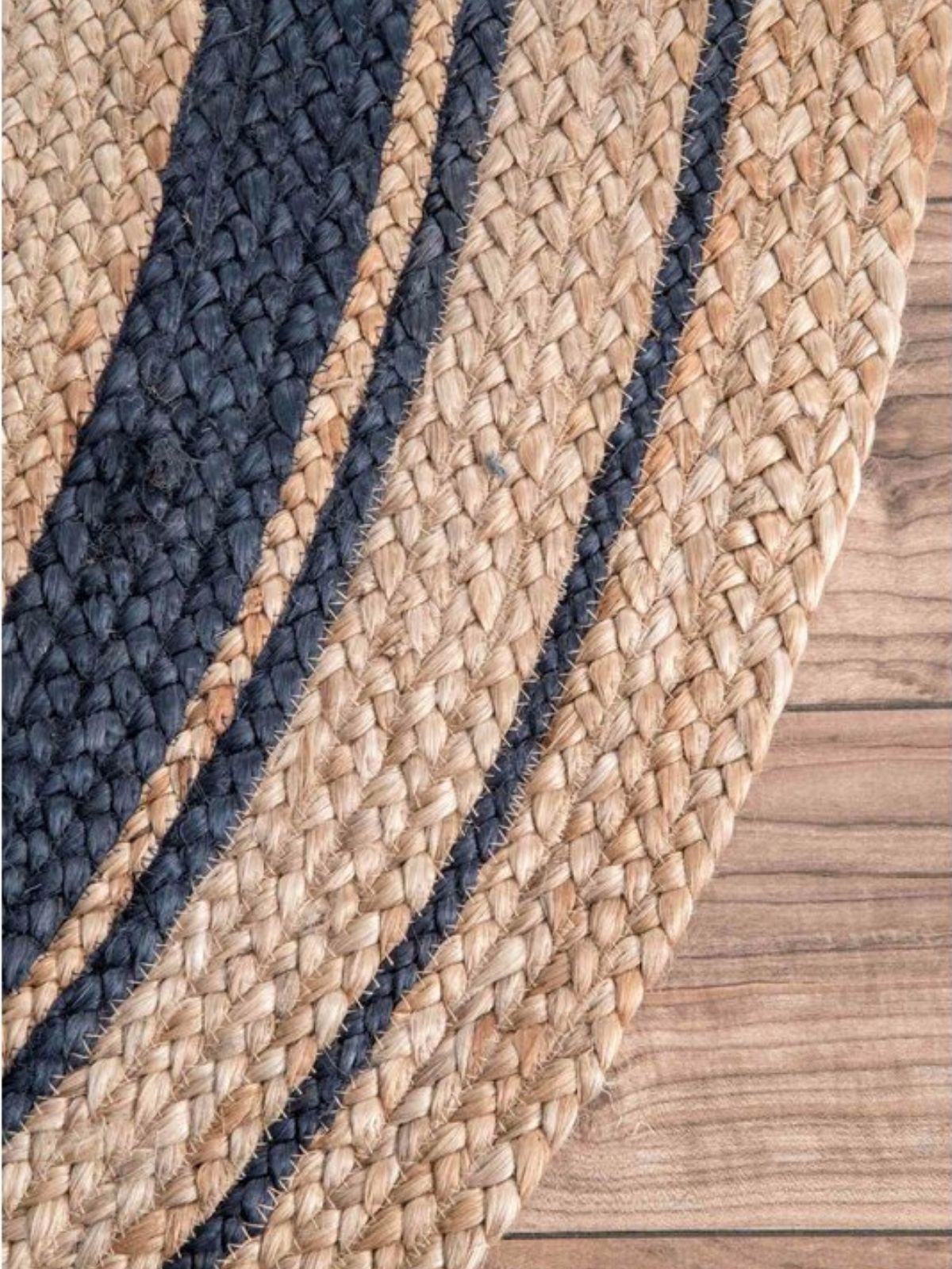 Suez bordered jute braided oval rug close-up showing the jute weave and striped pattern