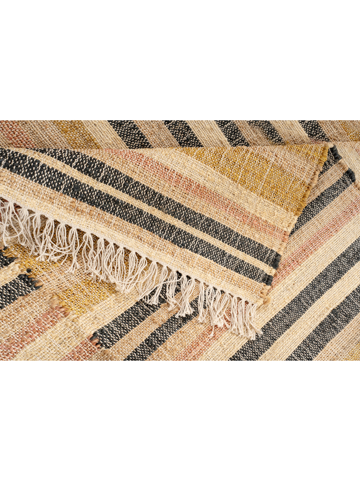 Sunset Stripes Handwoven Jute Rug detail of the striped jute surface and edge finishing