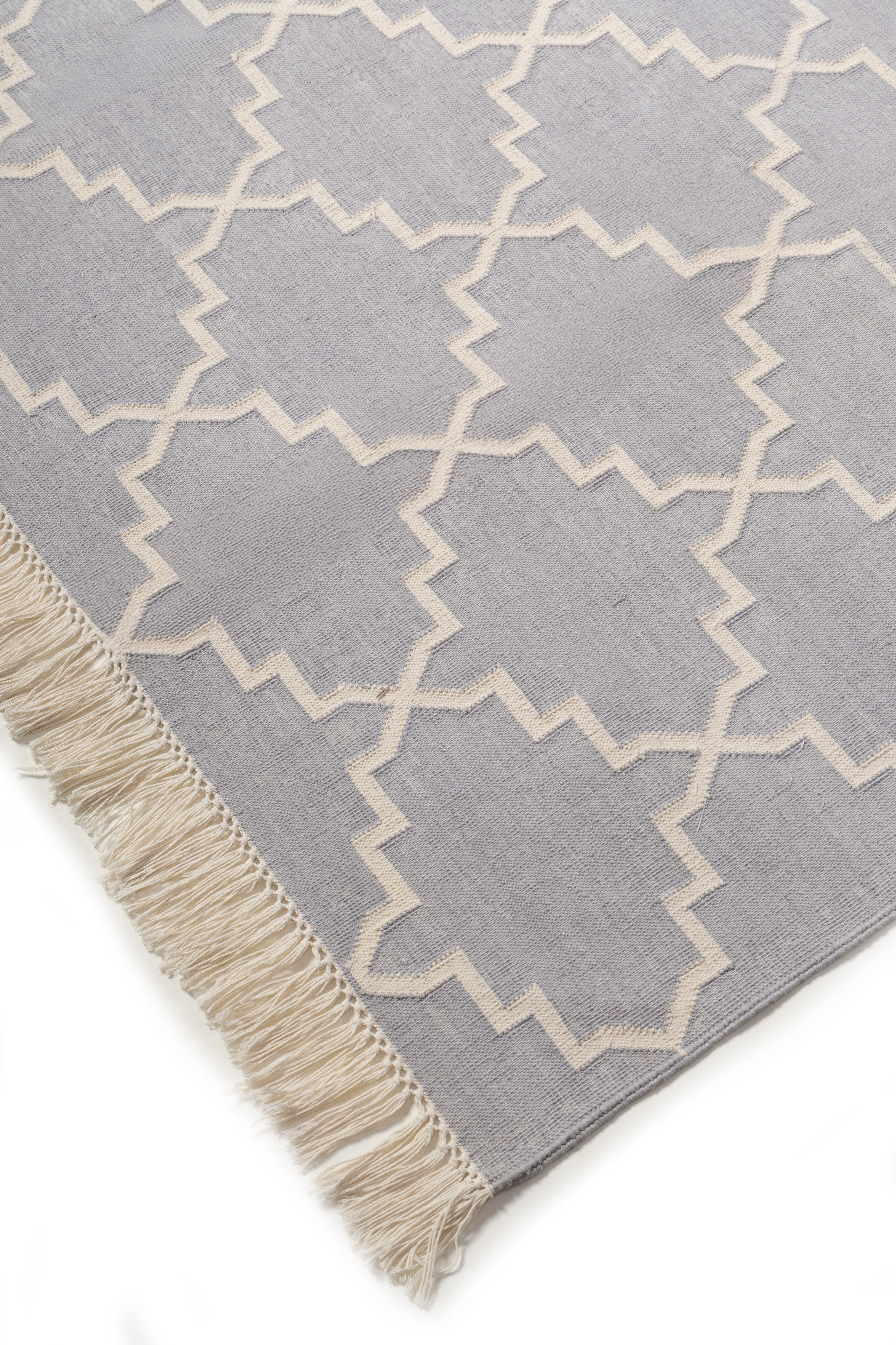 Symmetry Flatweave Rug-Grey close-up showing the cotton weave and geometric motif
