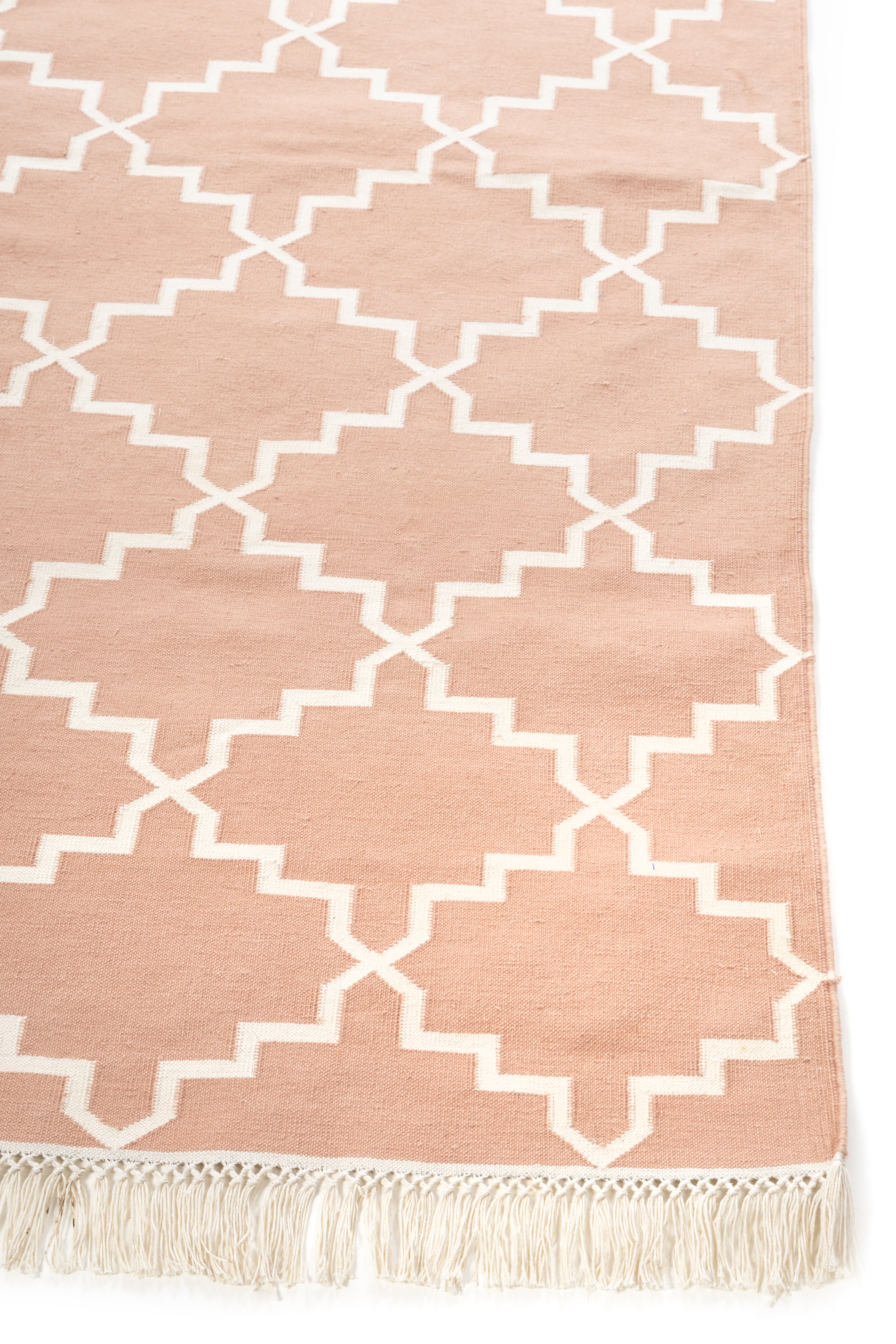 Symmetry Flatweave Rug-Peach cotton rug styled in a living room interior