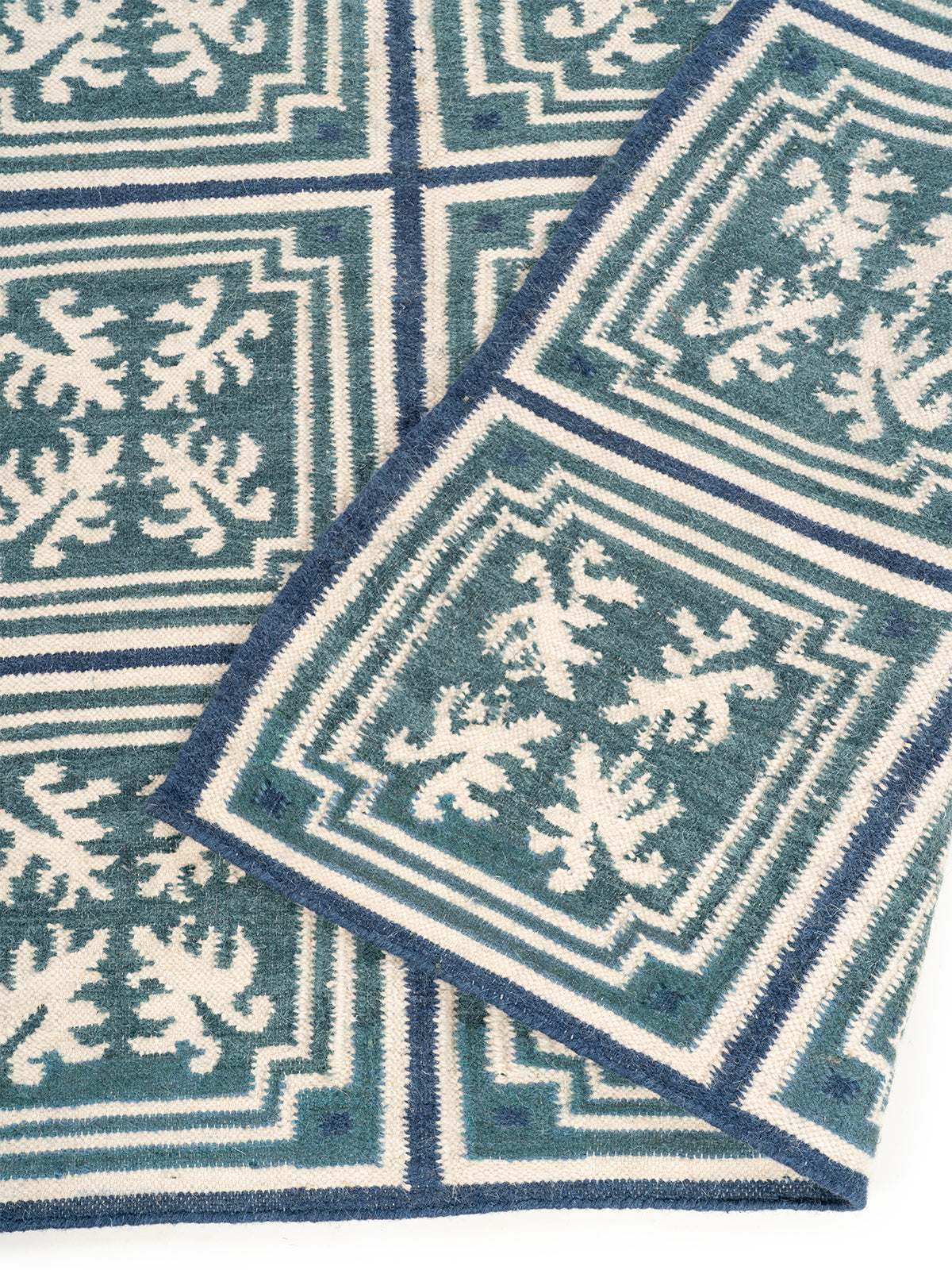 Teal & Indigo Grid Rug detail of the geometric pattern in wool