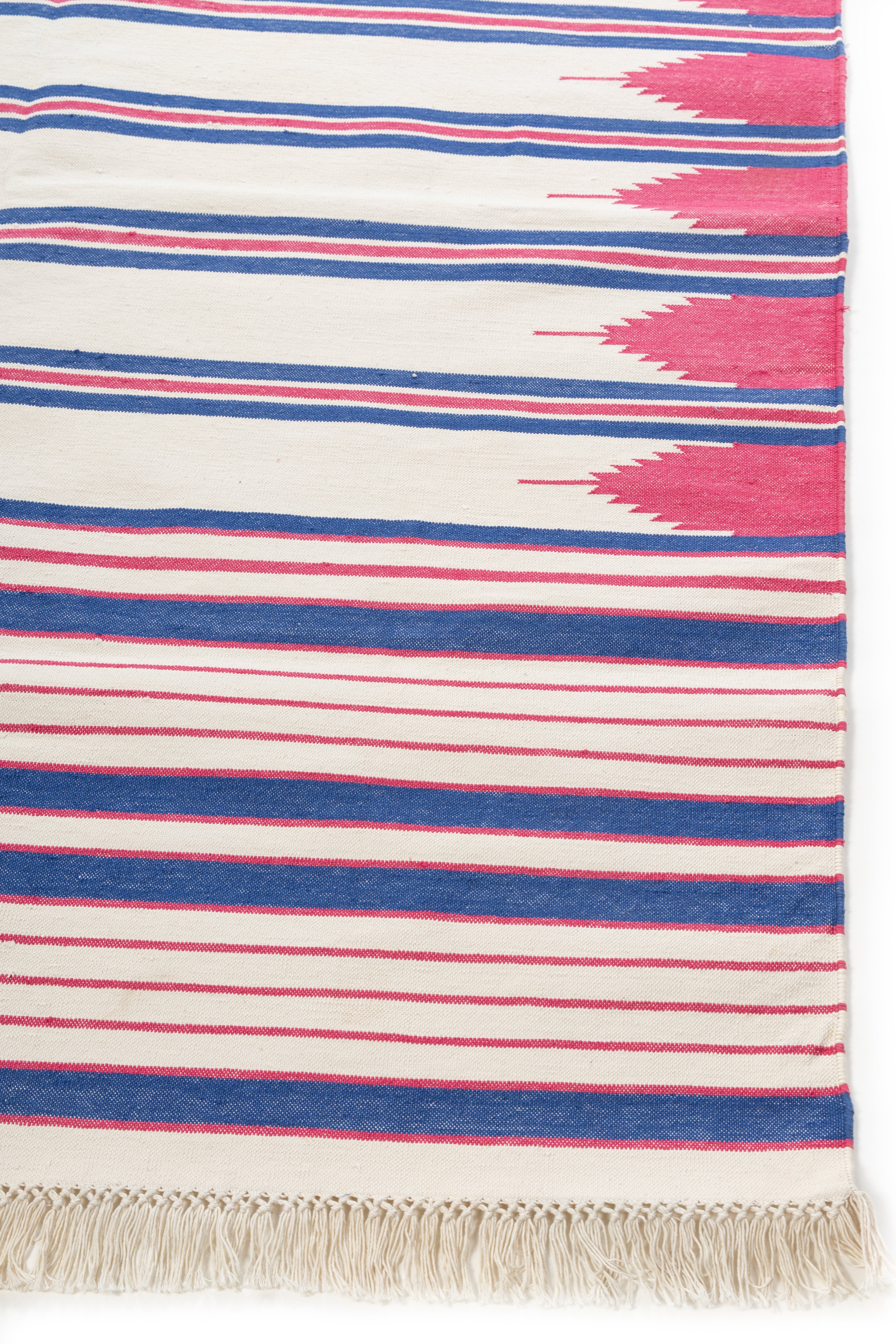 Temple Stripe Flatweave rug-Red cotton rug styled in a living room interior