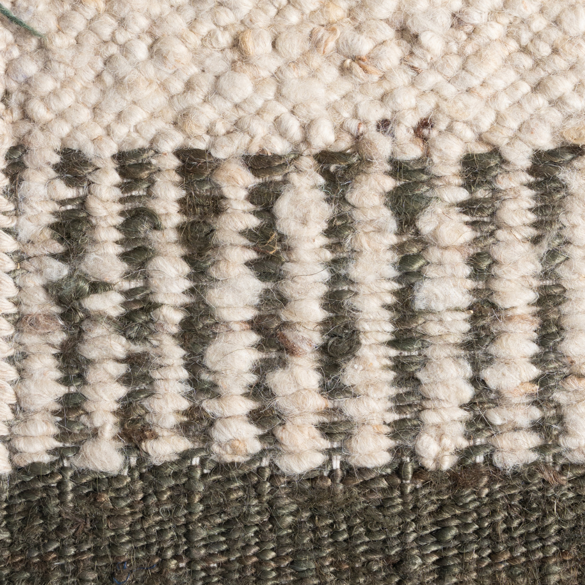 Terra Border : Moss Anchor close-up showing the wool-jute weave and surface texture