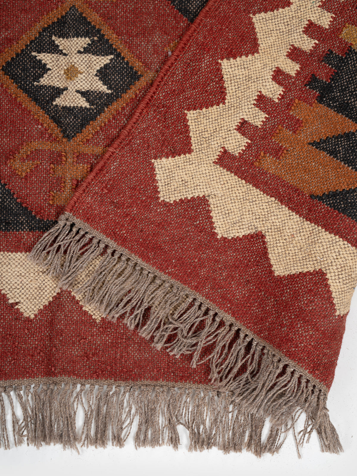 The Adobe Stack Rug detail of the geometric pattern in wool