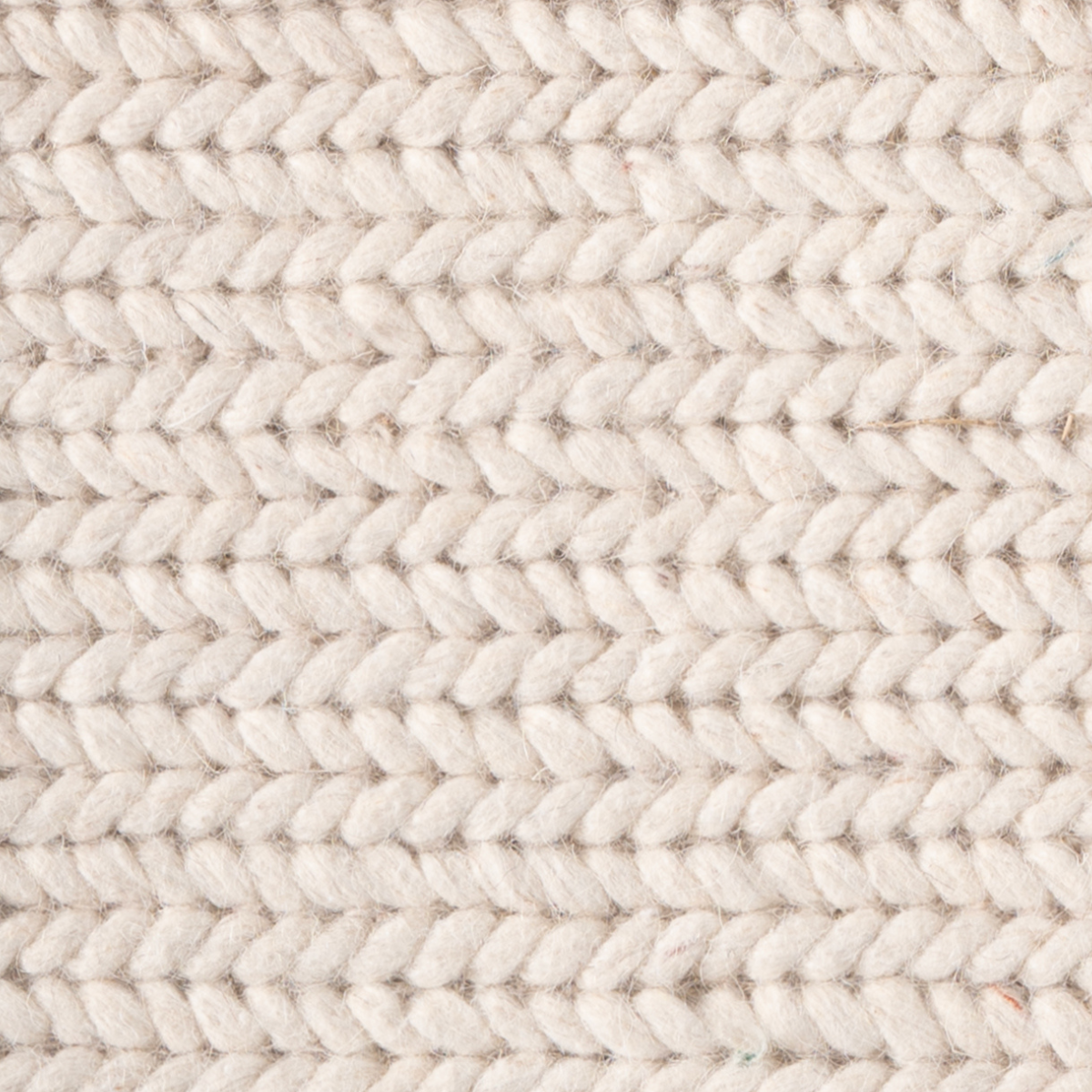 The Alpine Braid close-up weave detail showing the wool surface