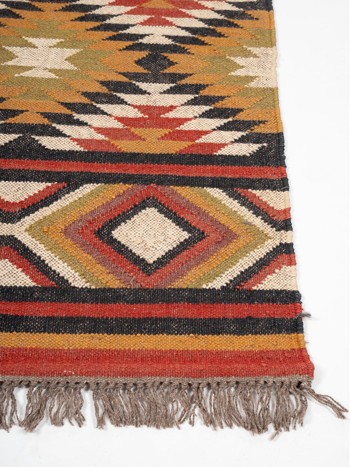 The Amber Rhythm Runner wool stair runner styled on a staircase in a designed interior