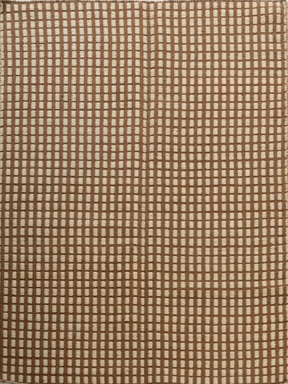 The Artisan Waffle wool rug in neutral tones