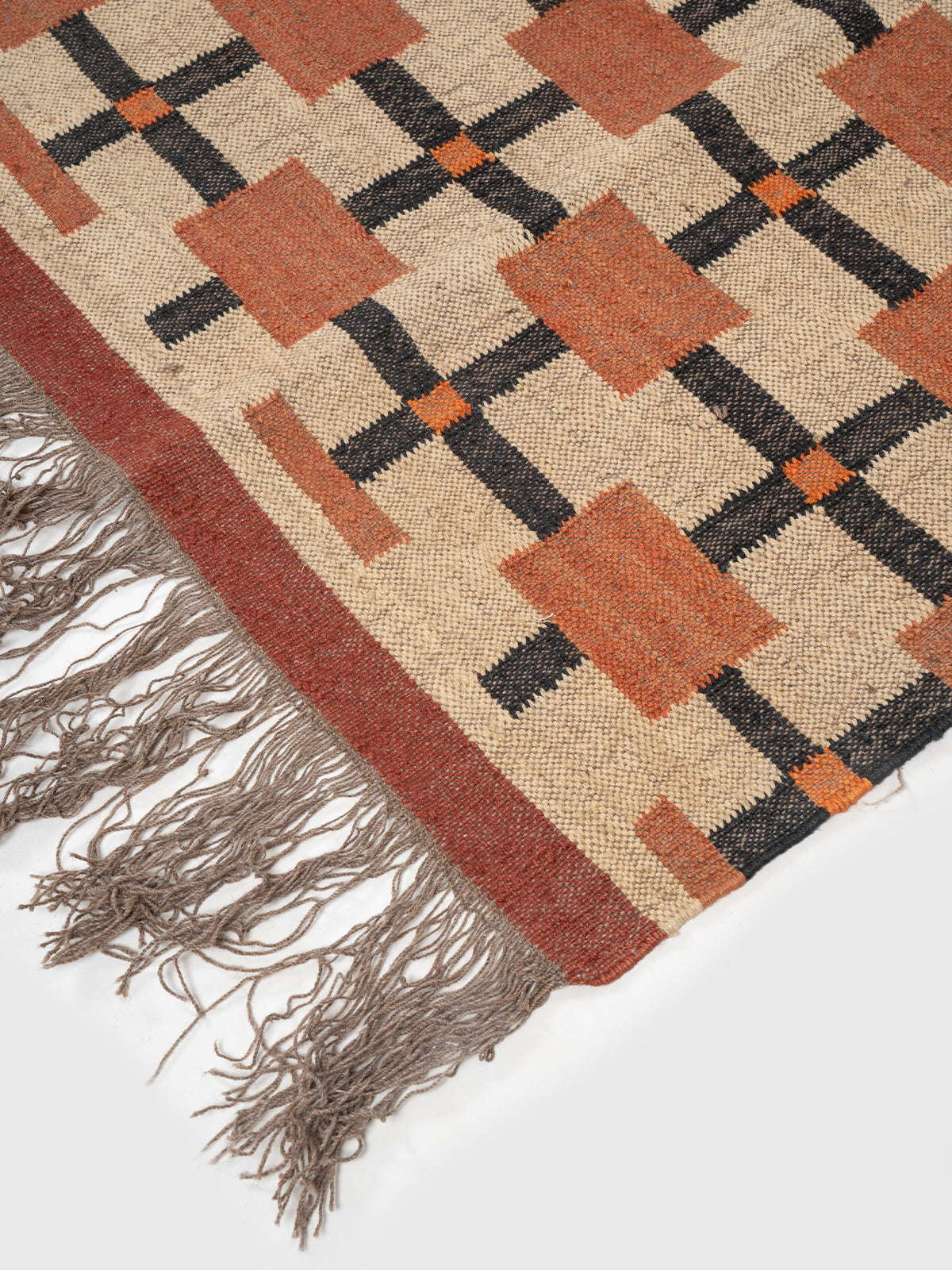 The Blush Ladder close-up showing the wool weave and striped pattern